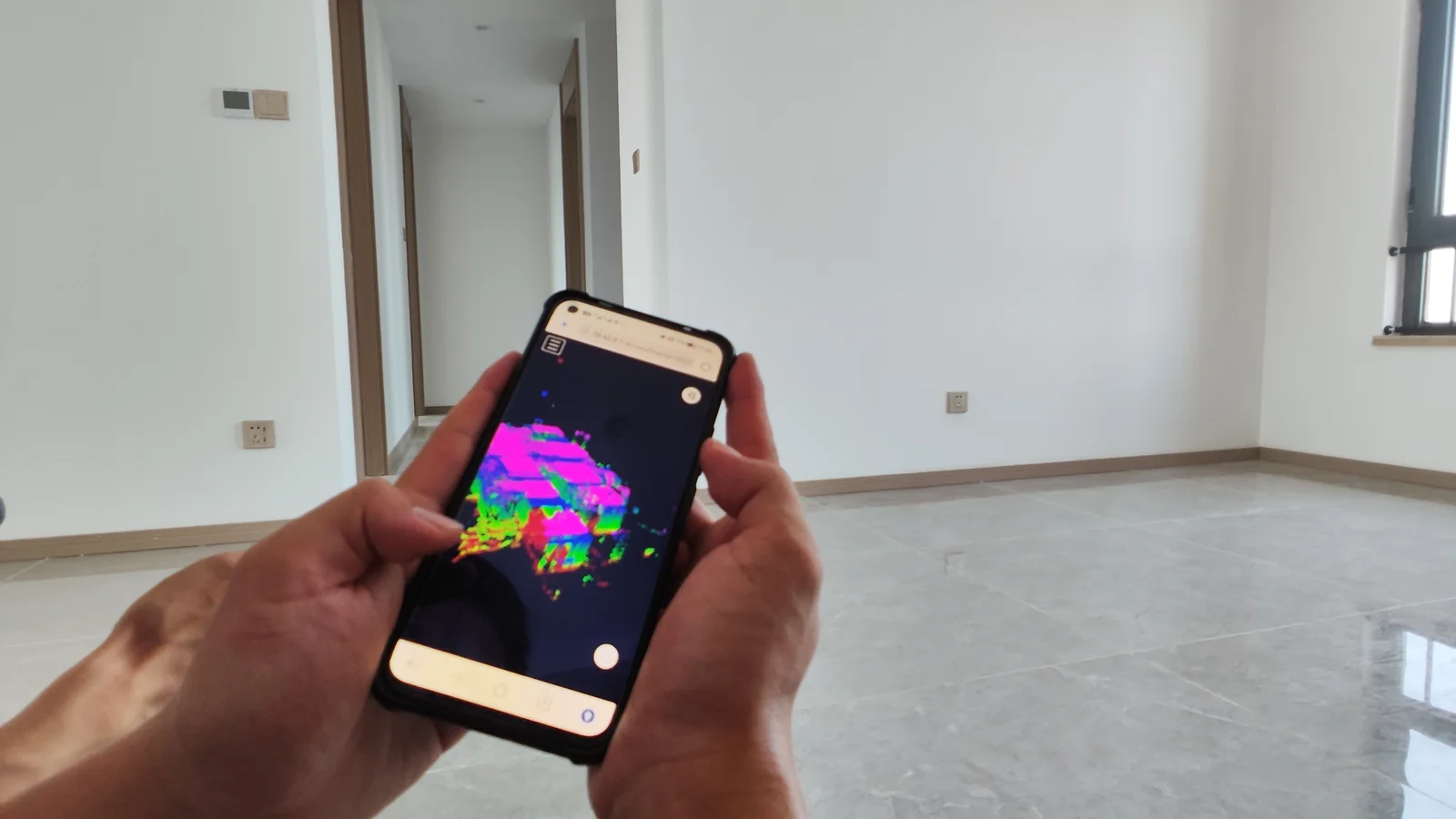 Realtidsvisning av punktmoln i FJD Trion Scan-appen under en byggnadsskanning