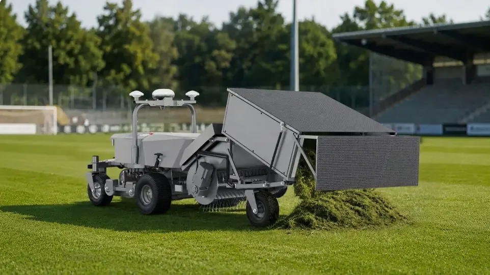 Rough Ranger collecting grass on a sports field
