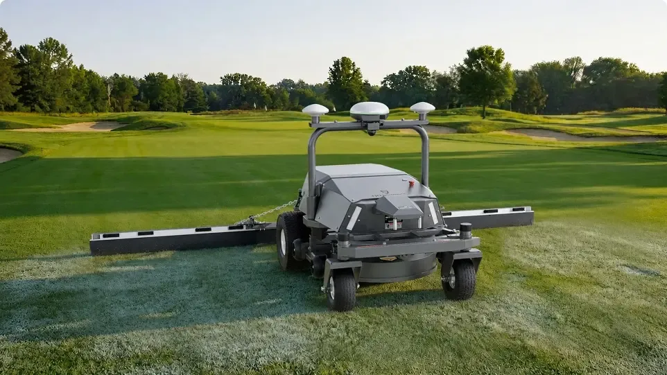 Rough Ranger brushing dew on a golf course