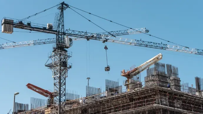 Construction site with tower cranes