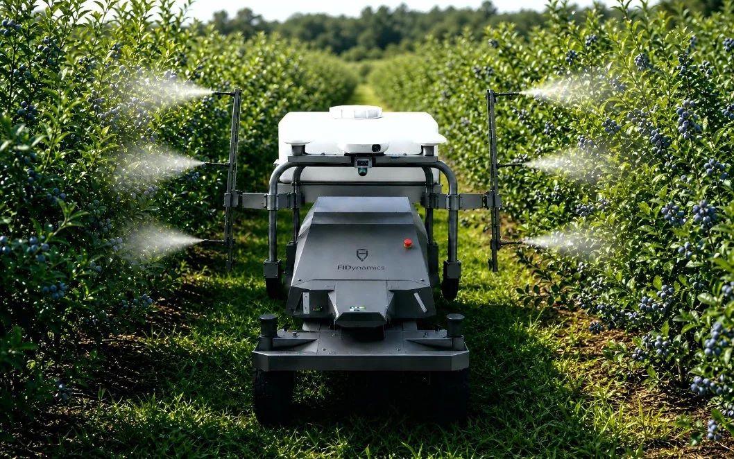 FJD XBot spraying between blueberry rows